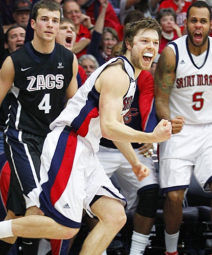 Matthew Dellavedova celebrates after drilling a 3-pointer in the second half against Gonzaga. (AP)