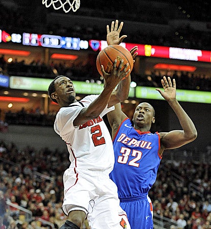 Louisville's Russ Smith goes in for two of his 25 points, helping to fill the void of leading scorer Kyle Kuric. (US Presswire)