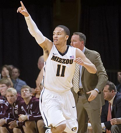 With a game-high 18 points, junior Michael Dixon scores in double digits for the seventh time in his past nine games.  (AP)