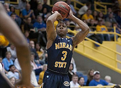 Isaiah Canaan scores 20 points to help Murray State escape OVC tourney champ Morehead St. and remain one of two unbeatens. (AP)
