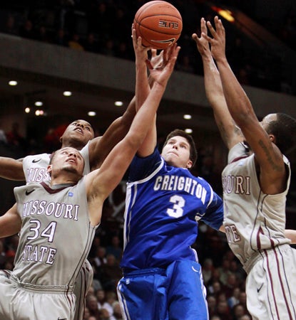 Creighton star Doug McDermott adds 15 points in a close one against Missouri State. (AP)