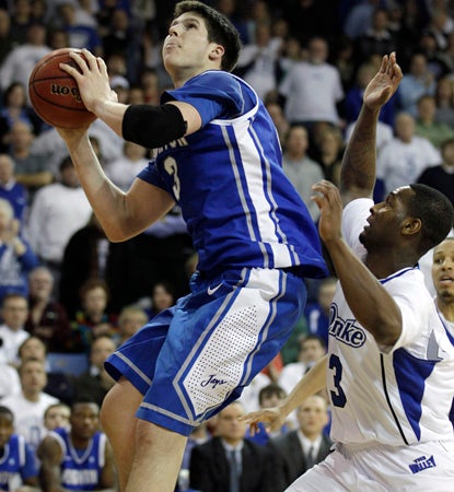 Creighton superstar Doug McDermott carries his team with 30 points in a road win over Drake. (AP)