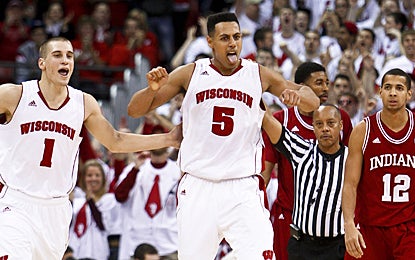 Ryan Evans (center) celebrates during the final seconds as the Badgers beat the Hoosiers. (AP)