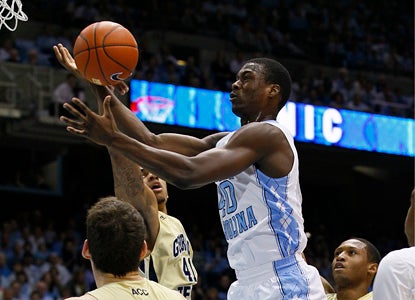 Tar Heels star Harrison Barnes scores 23 points and goes 3-for-3 from downtown in a win over Georgia Tech. (AP)