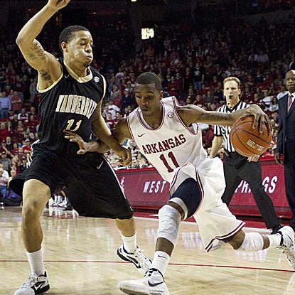 Five players score in double figures for Arkansas, including B.J. Young, who adds 12 points. (AP)