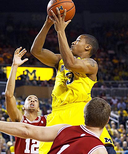 Trey Burke goes 5 for 9 from the field for 18 points as the Wolverines stay unbeaten at home. (US Presswire)