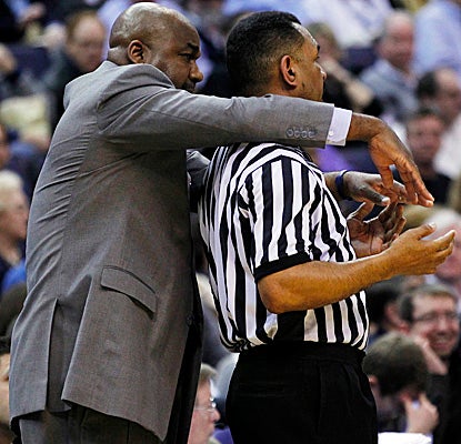 Coach John Thompson III demonstrates what he believes a foul looks like as No. 14 Georgetown clamps down on South Florida. (US Presswire)