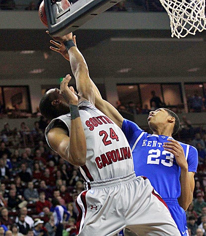 Anthony Davis scores 22 points, grabs eight rebounds and makes eight blocks as No. 1  Kentucky whips South Carolina. (US Presswire)