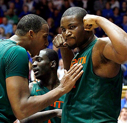 Hurricanes big man Reggie Johnson flexes his muscles in Durham, scoring a career-high 27 points in Miami's upset win. (AP)