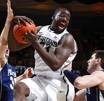 Michigan State's Draymond Green snares one of his 12 rebounds against the Nittany Lions. (AP)