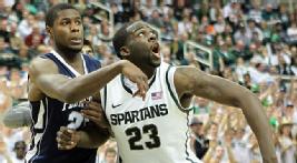 Draymond Green played through the pain to lead Michigan State over Penn State and Michigan.