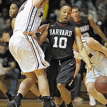 Brandyn Curry and the Crimson improve to 7-0 in conference play with their win over Penn.  (US Presswire)