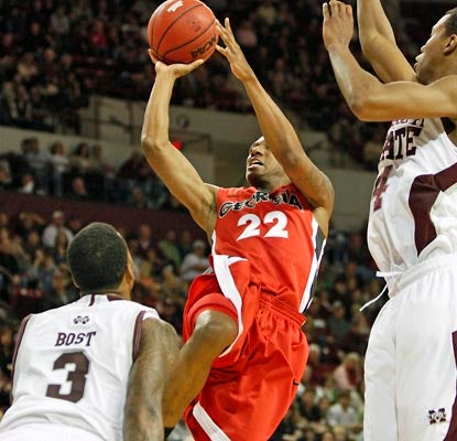 Gerald Robinson contributes 13 points for the Bulldogs, including the game-tying layup with 27 seconds left in regulation.  (AP)