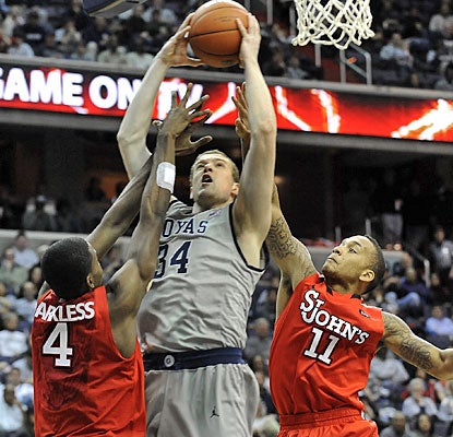 Nate Lubick fills up the stat sheet for Georgetown with seven points, eight rebounds, five assists and four blocks.  (AP)