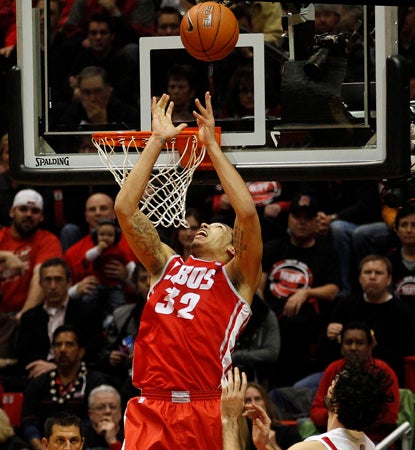 Drew Gordon skies high for one of his 17 rebounds on the night, and adds 17 points in an upset of No. 13 San Diego State. (AP)
