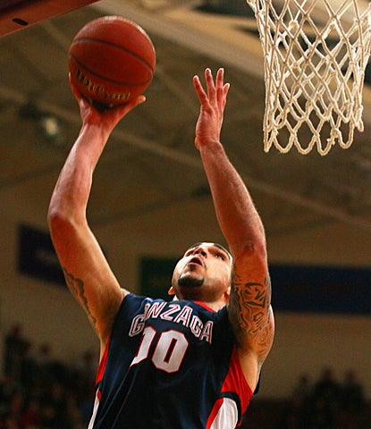 Gonzaga's Robert Sacre goes up for a basket, scoring two of his 20 points against Santa Clara. (AP)