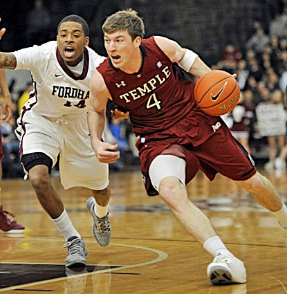 Temple's Juan Fernandez (right) scores 19 points to lead the Owls to an 80-60 victory over Fordham. (AP)