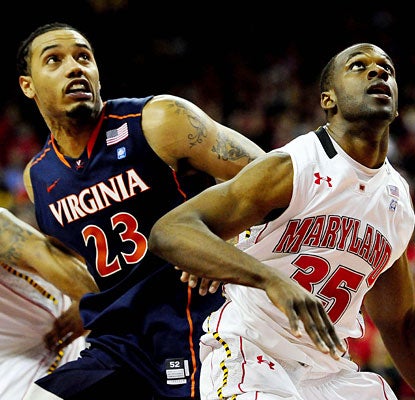 Mike Scott outmuscles James Padgett and the Terps to score a career-high 35 points and snare 11 rebounds.  (US Presswire)