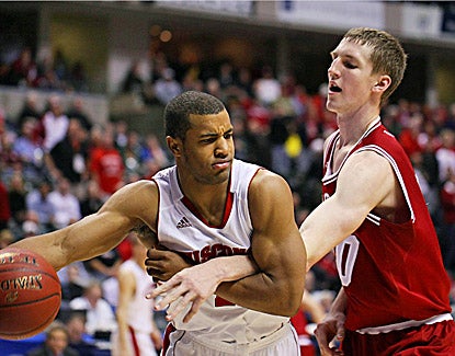  Wisconsin's Jordan Taylor drives past Indiana's Cody Zeller while scoring 12 points in the Badgers' 79-71 win. (US Presswire)