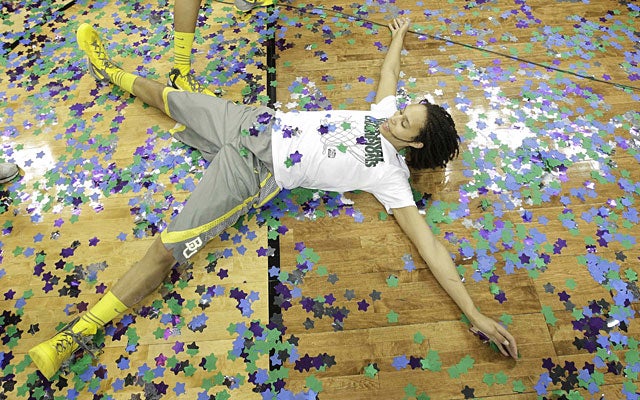Brittney Griner celebrates after leading Baylor to the first 40-0 season in college hoops history. (AP)