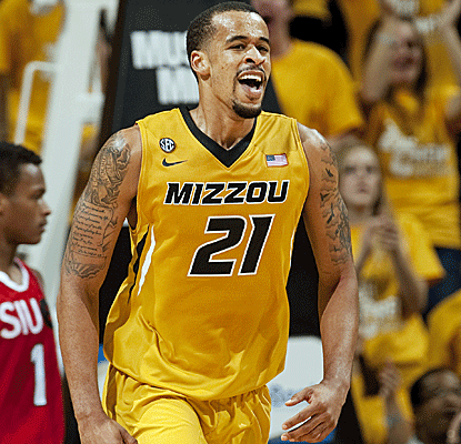 Laurence Bowers leads Missouri with 20 points, adding seven rebounds as the Tigers win easily in their season opener.  (AP)