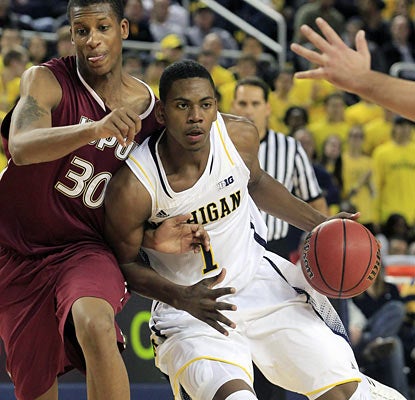 Glenn Robinson III provides 21 points and six boards as the Wolverines take care of business against IUPUI. (AP)