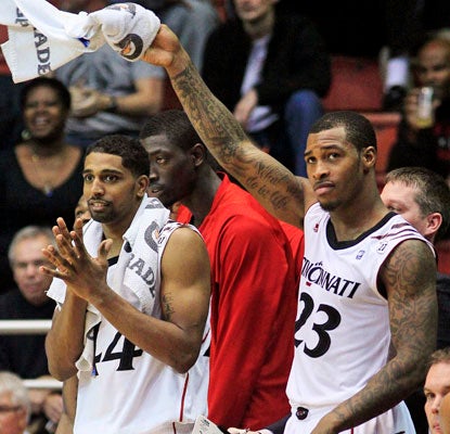 Sean Kilpatrick (right) and JaQuon Parker combine for 33 points and watch as the bench finishes off the blowout win.  (US Presswire)