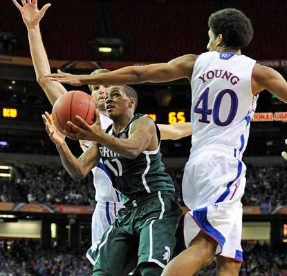 Keith Appling scores two of his 19 points with this clutch layup with 13.5 seconds left in the game.  (US Presswire)