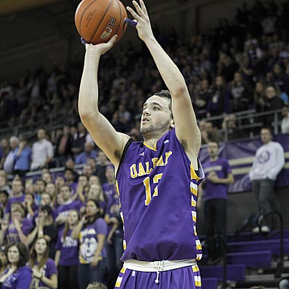 Albany's Peter Hooley makes this 3-pointer to put the Great Danes ahead 61-60 with 35 seconds left. (US Presswire)