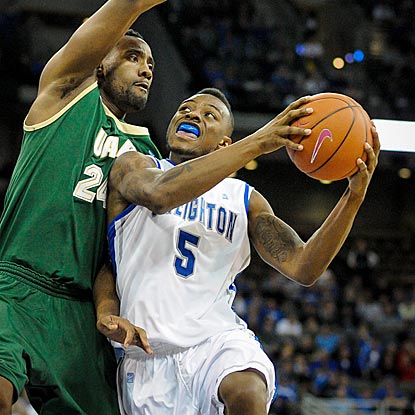 Creighton's Josh Jones, who scores all 18 of his points in the second half, drives on UAB's Preston Purifoy.  (Getty Images)