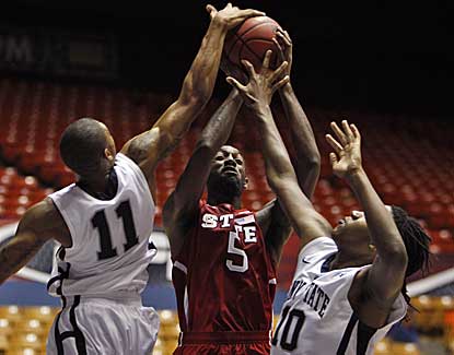 NC State's C.J. Leslie has his shot blocked Thursday in the Wolfpack's 72-55 win over Penn State.  (AP)