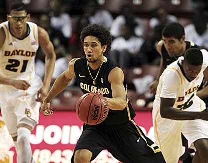 Colorado's Askia Booker dribbles upcourt Friday in the Buffaloes' upset of Baylor. Booker finishes with a game-high 19 points. (AP)