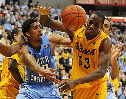 North Carolina's James Michael McAdoo battles with Long Beach State's Nick Shepherd. (US Presswire)