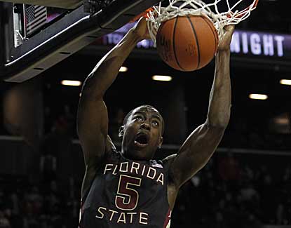 Montay Brandon drunks as Florida State tops St. Joe's to win the Coaches vs. Cancer Classic title. (AP)