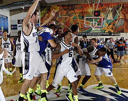 Chaminade players celebrate at midcourt after upsetting the Texas Longhorns on Monday night. (US Presswire)