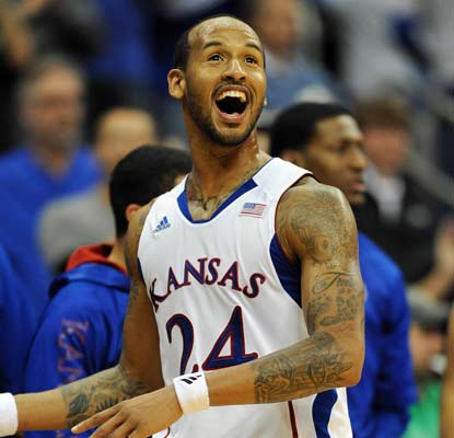 Kansas' Travis Releford scores 21 of his 23 points in the first half to help the Jayhawks win the CBE Classic title.  (US Presswire)