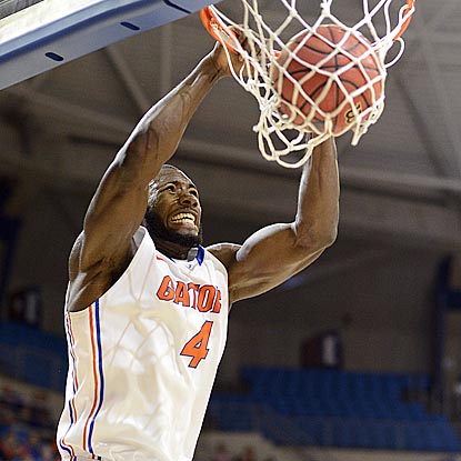 Patric Young notches his easiest two points of the evening during Florida's dominant first half.  (AP)