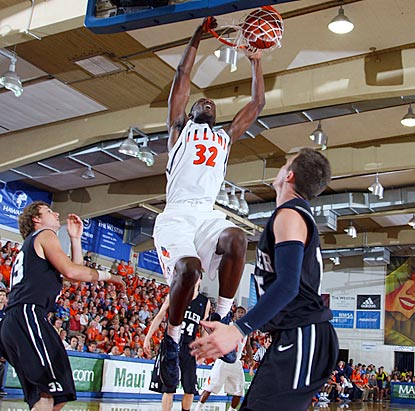 Butler defenders Chase Stigall (left) and Rotnei Clark (right) can only watch as Nnanna Egwu dunks for Illinois.  (US Presswire)