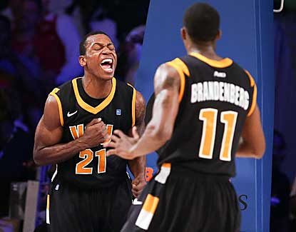 VCU's Treveon Graham (21) and Rob Brandenberg combine for 11 straight points late in the VCU win. (US Presswire)