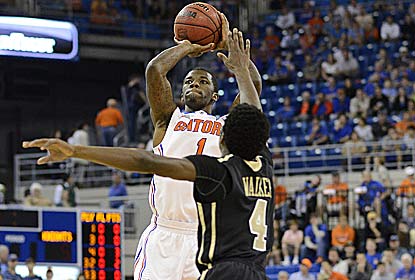 Kenny Boynton, three days after spraining his left ankle, goes 7 for 15  en route to a season-high 24 points for UF. (AP)