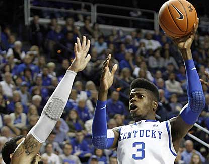 Kentucky center Nerlens Noel puts up a shot over LIU Brooklyn's Julian Boyd in the Wildcat victory. (AP)