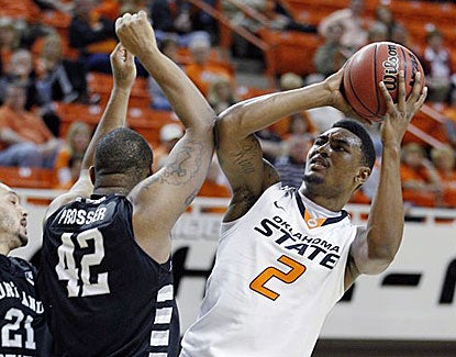 Oklahoma State guard Le'Bryan Nash scores 20 points for the Cowboys, continuing his solid play this season.  (AP)
