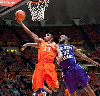 Illinois' Tracy Abrams beats Western Carolina's Tawaski King to the hoop for a layup in the first half.  (US Presswire)