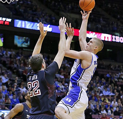 Mason Plumlee racks up 16 points and 14 boards as the Blue Devils keep their perfect season intact. (US Presswire)