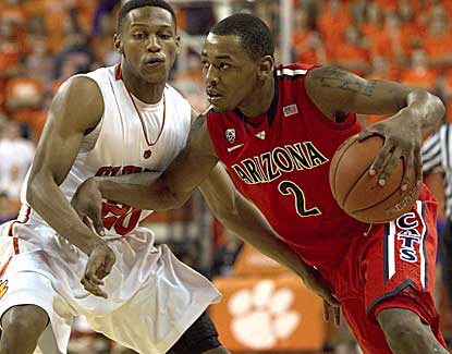 Arizona guard Mark Lyons attempts to drive past Clemson's Jordan Roper on Saturday night. (US Presswire)
