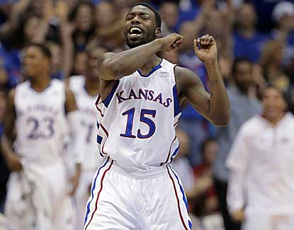 Kansas' Elijah Johnson celebrates a basket for two of his seven points in KU's' win over Belmont. (AP)