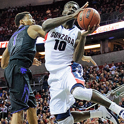 Gonzaga's Guy Landri Edi drives to the hoop as Gonzaga pulls away from K-State in the second half.  (US Presswire)