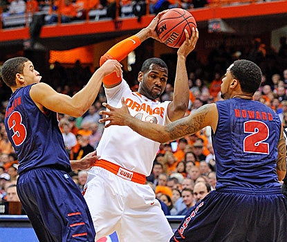 James Southerland, who scores a game-high 22 points, fights through two Detroit defenders. (US Presswire)