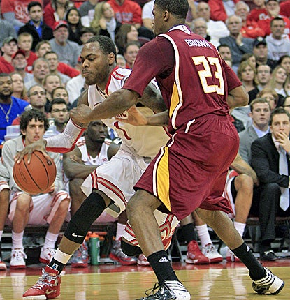 Deshaun Thomas (left) scores 21 points and adds nine rebounds to lead Ohio State past Winthrop. (AP)
