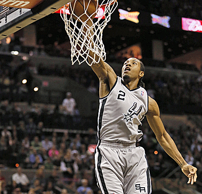 Kawhi Leonard puts in 17 points as the Spurs use a balanced attack to spoil Dirk Nowitzki's season debut.  (US Presswire)